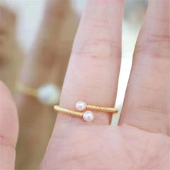 14K Gold Pearl Ring with Winding Design